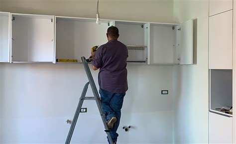 hanging wall cabinets on steel studs|attaching cabinets to metal studs.